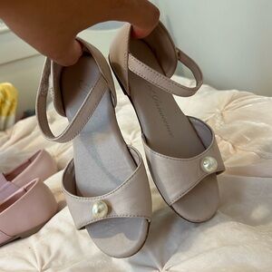 Age of Innocence Sandals size 28 , measure a bit more than 7 inches.